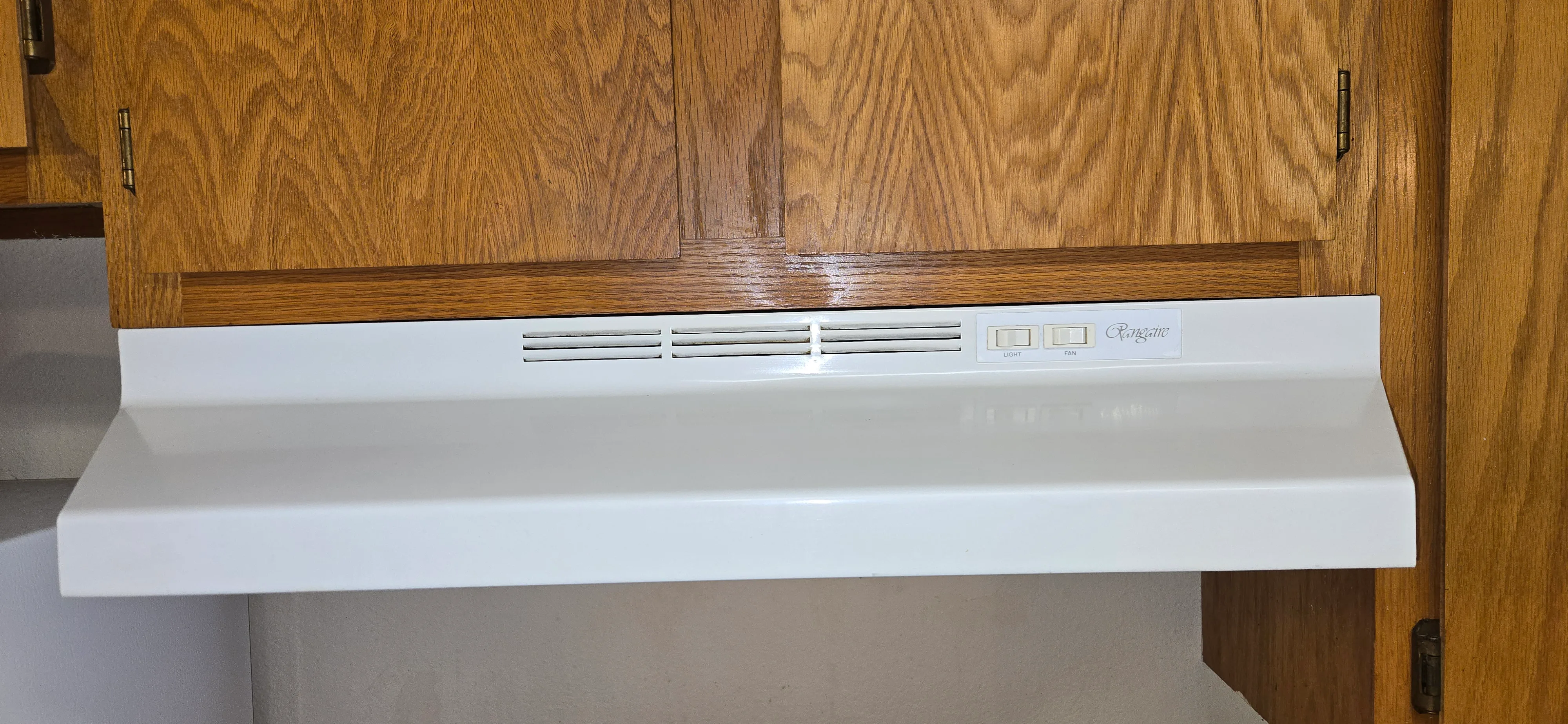 Range hood after cleaning with the finish wiped down and reset